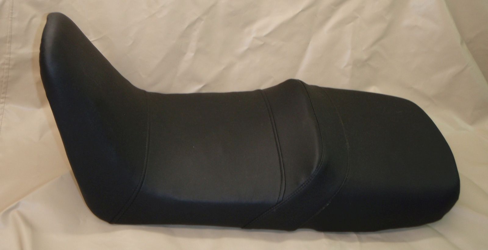 Motorzadel opnieuw bekleden