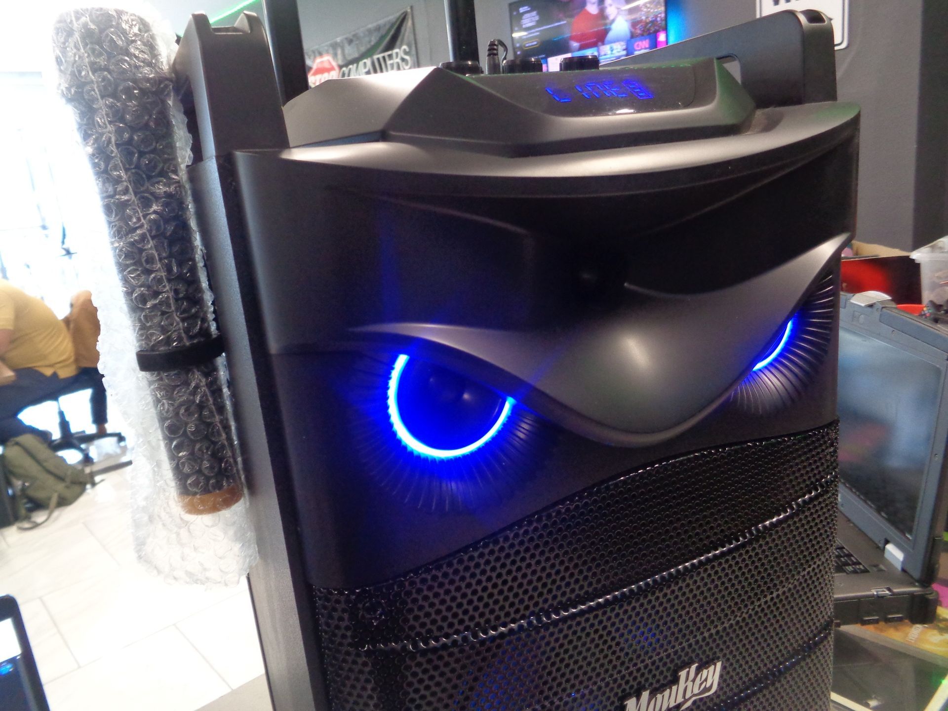 Black speaker with blue illuminated 