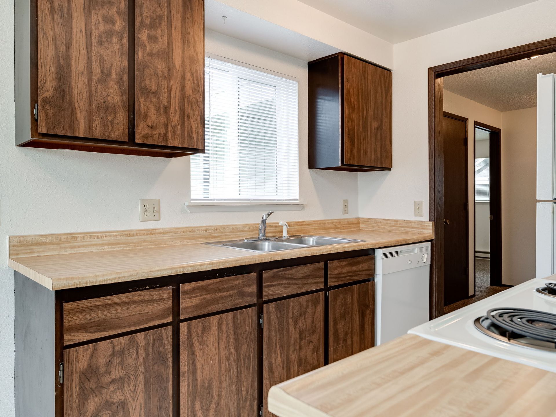 Southridge Apartments 2Bed/1Bath with cabinetry and sink.
