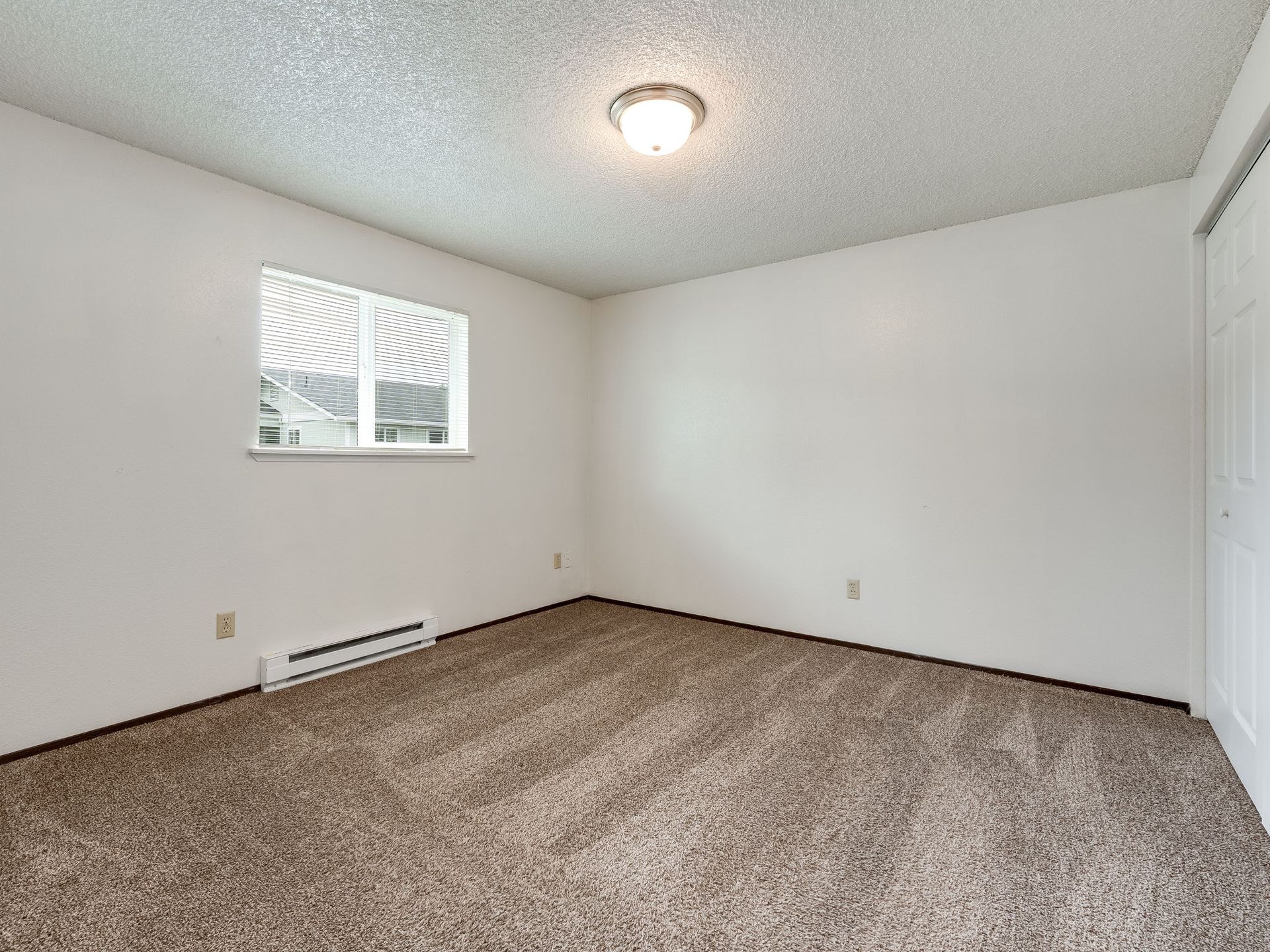Southridge Apartments 2Bed/1Bath bedroom 1 with view of window.