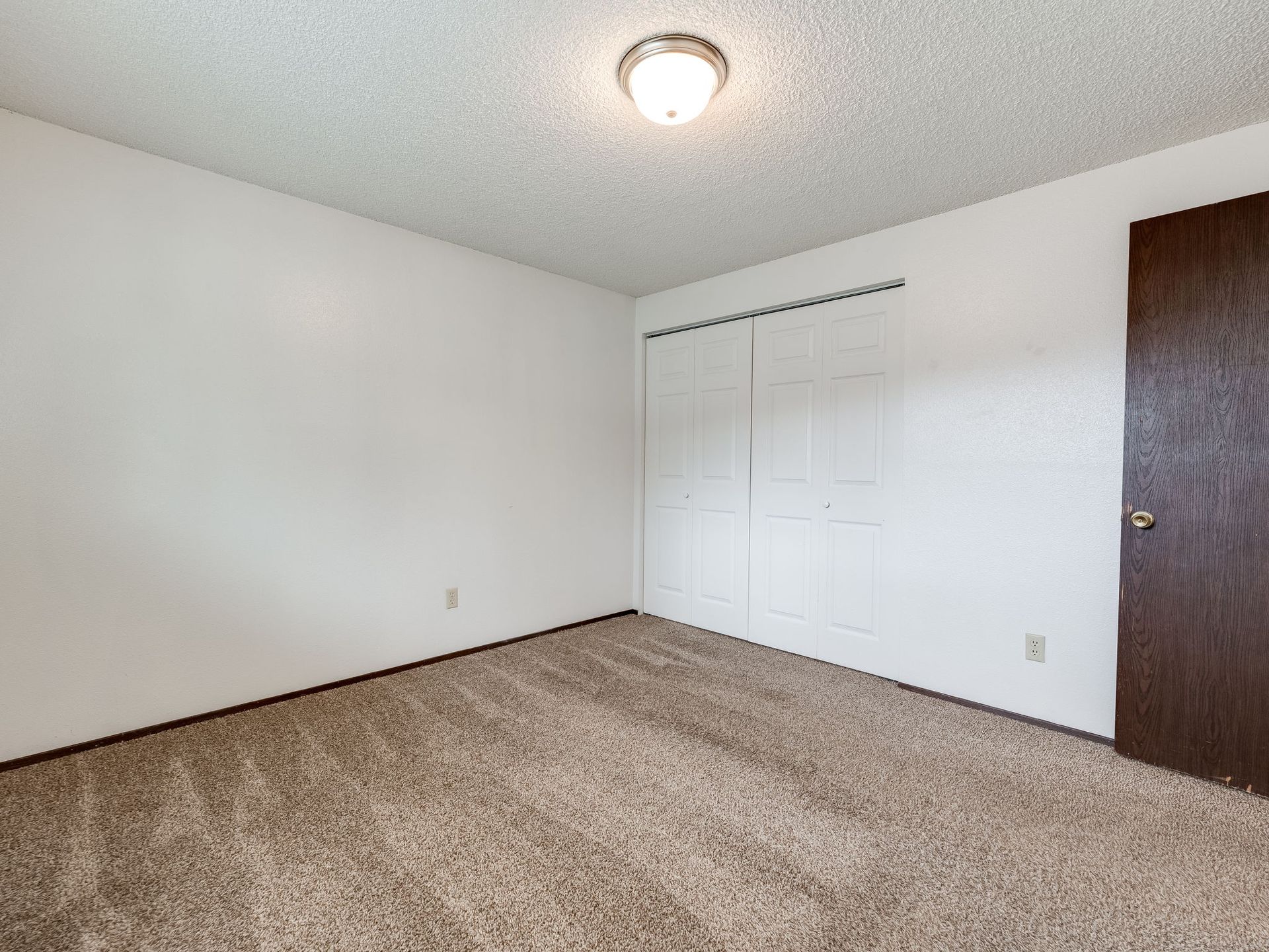 Southridge Apartments 2Bed/1Bath bedroom 1 with view of closet.