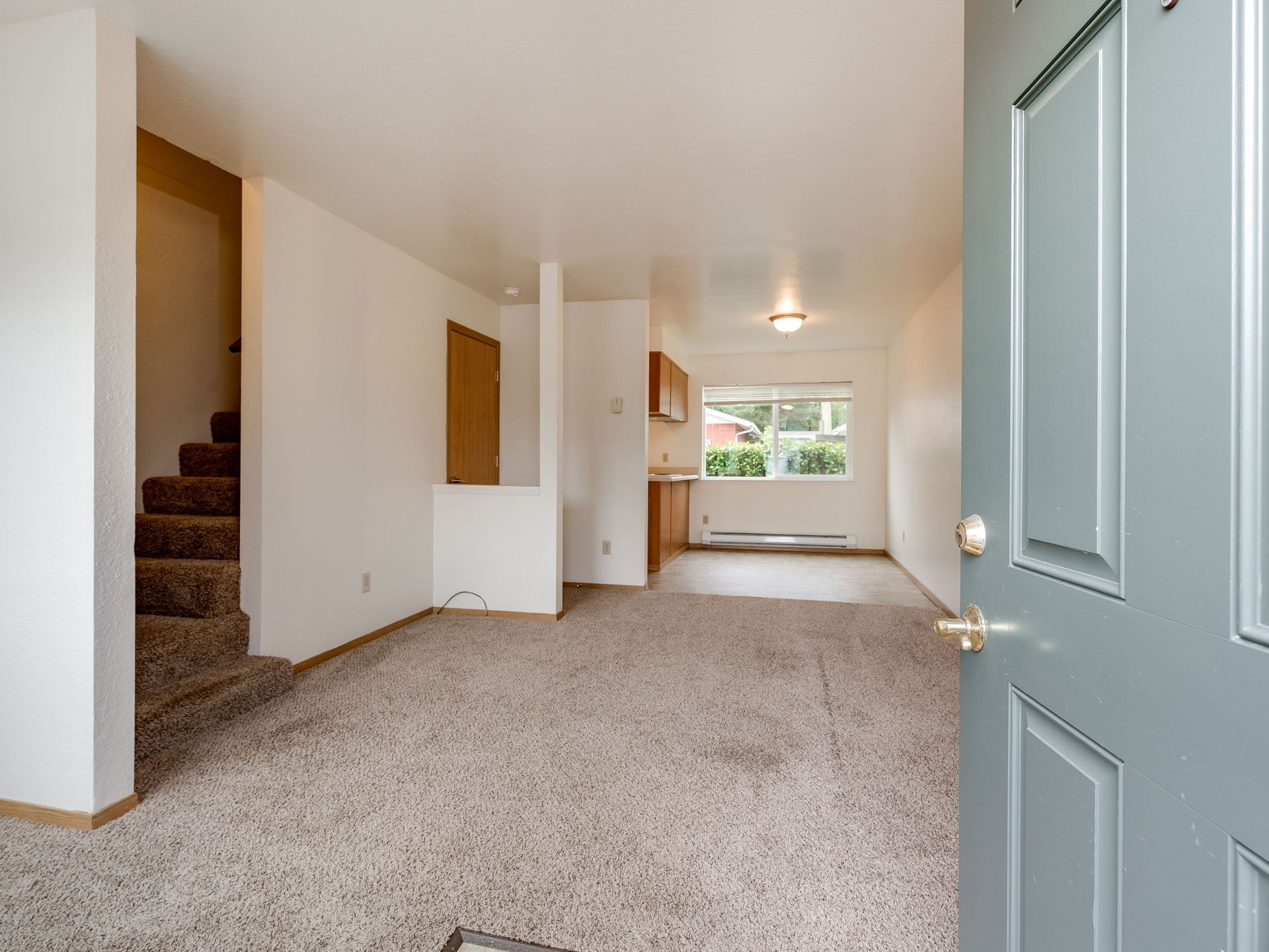 Southridge Apartments Townhome spacious living room leading into dining room.