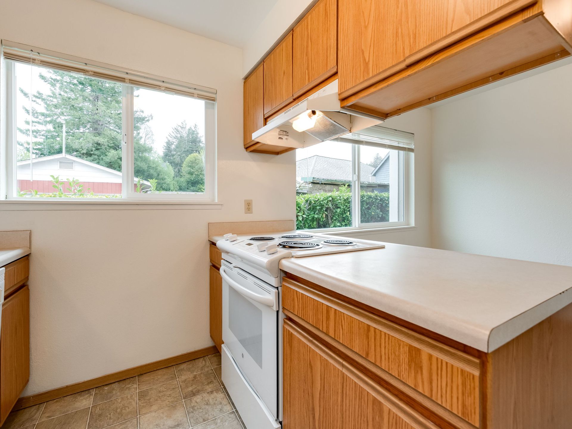 Southridge Apartments Townhome kitchen with view of range.