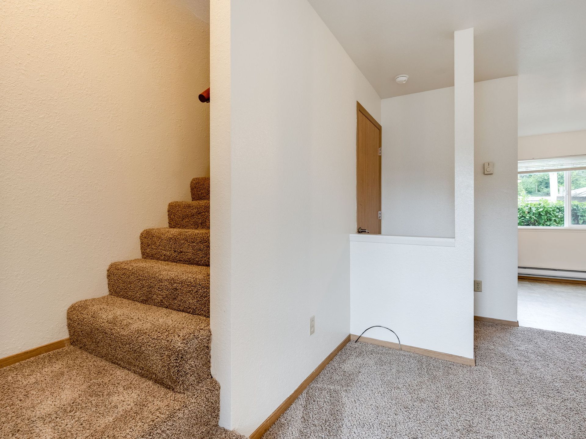 Southridge Apartments Townhome stairway leading upstairs.