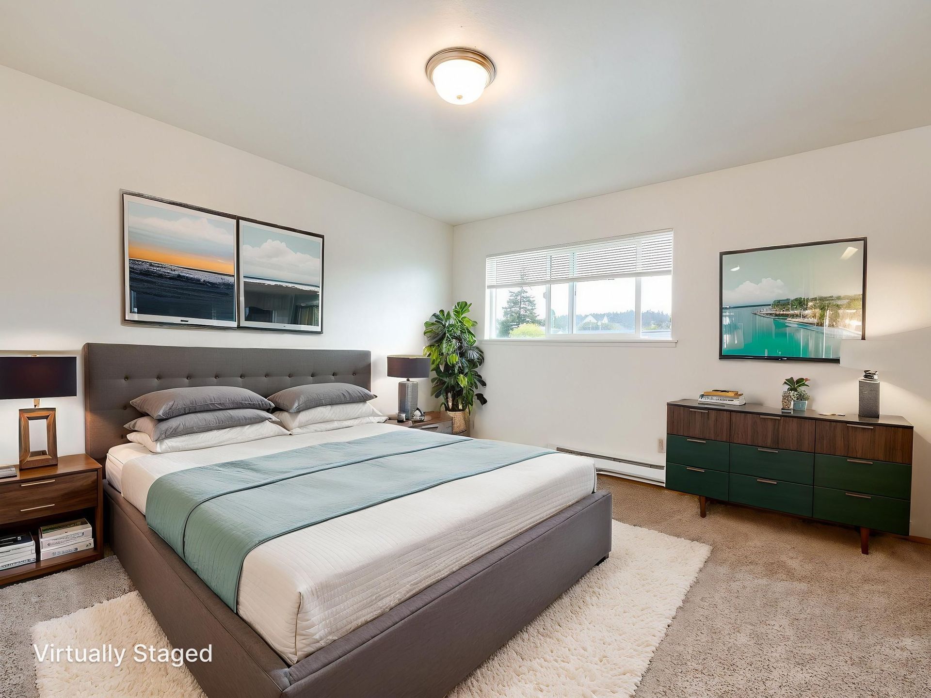 Southridge Apartments Townhome bedroom 1 with view of window virtually staged.
