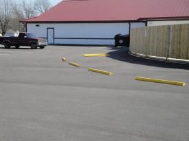 A Truck Is Parked In A Parking Lot In Front Of A Building | Manilla, IN | Floyd Crim & Sons Paving