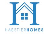 A blue and white logo for a real estate company.