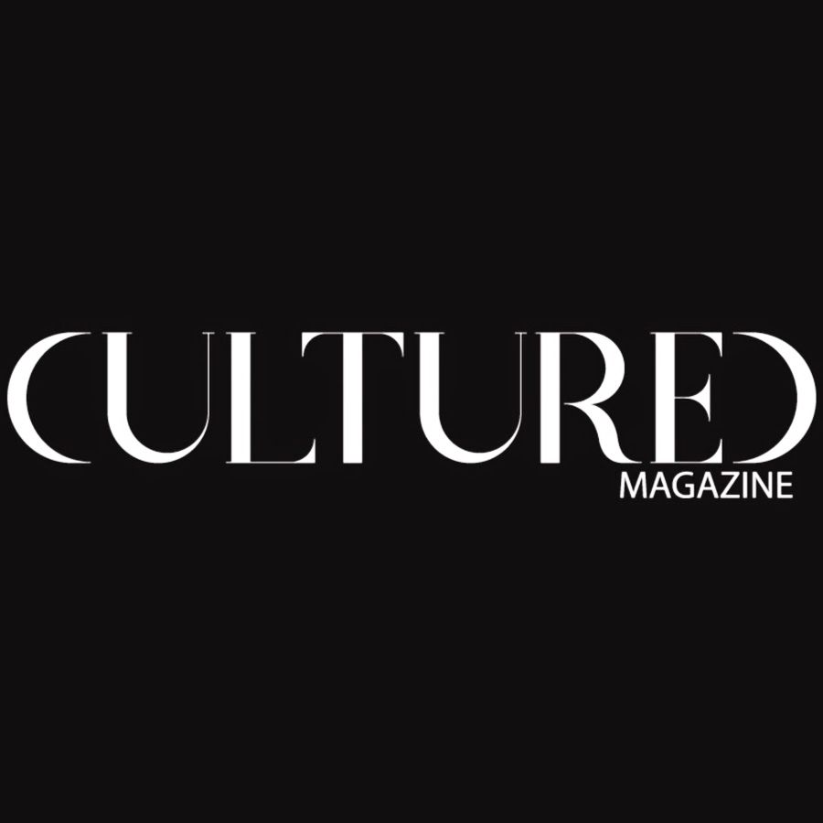 A black and white logo for a magazine called cultured magazine