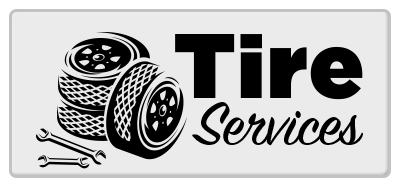 Black-and-white Tire Services sign with stacked tires and wrench graphic