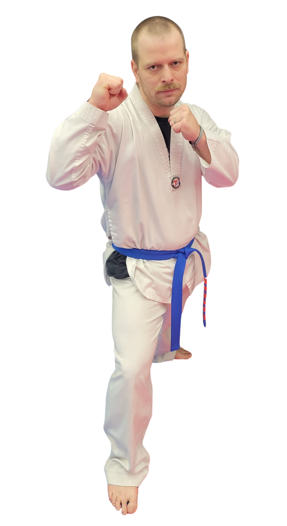 two adults sparring in martial arts