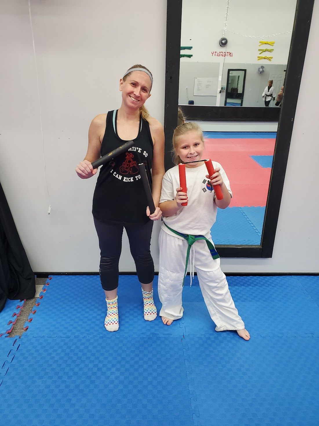 An aerial view of a city skyline at sunset.