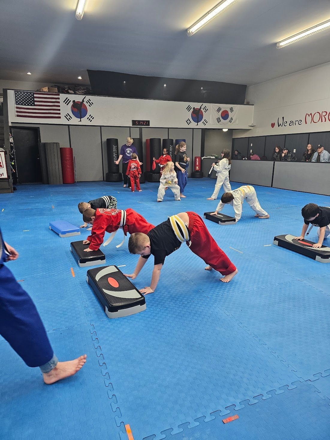 A blurry picture of a bunch of colorful lights on a dark background.