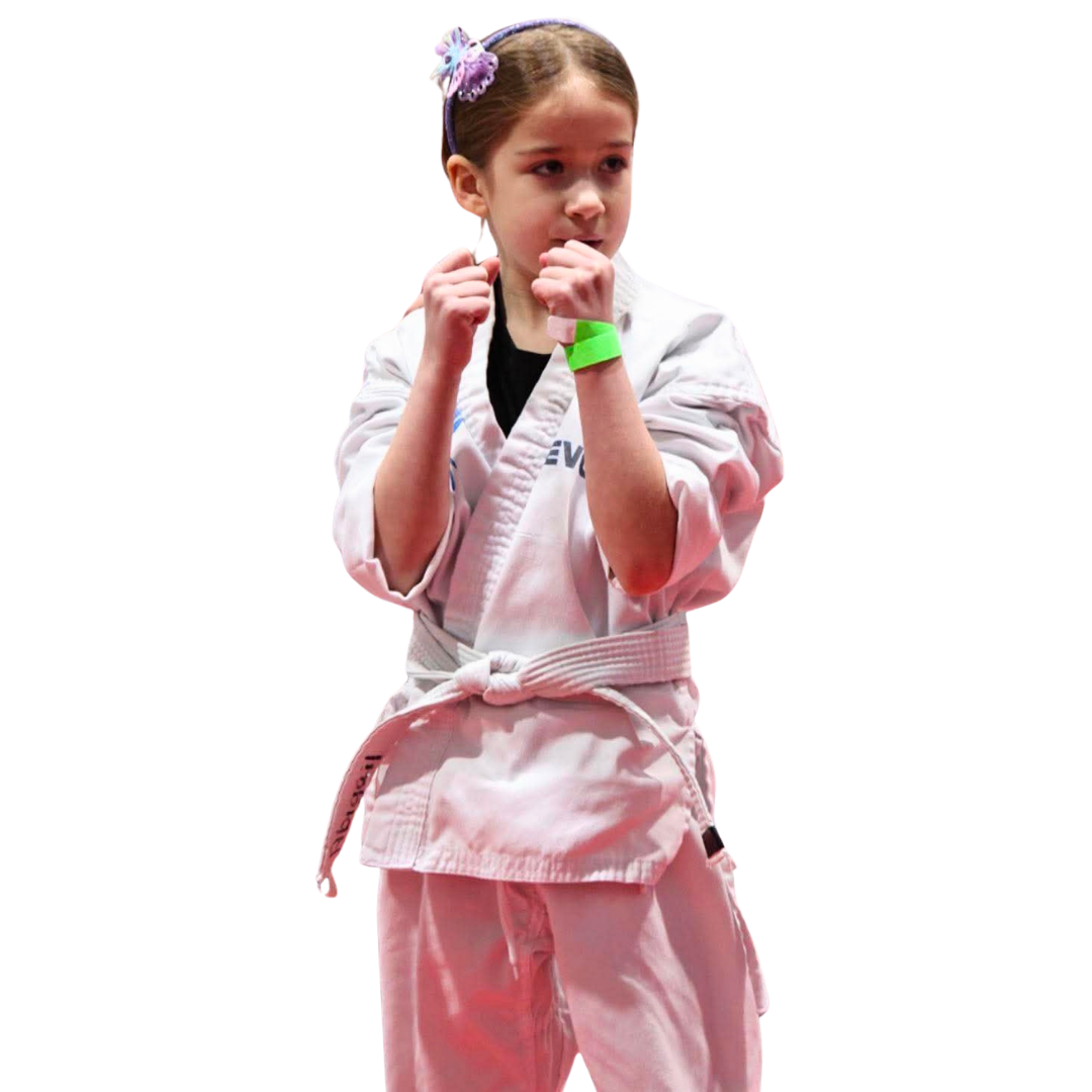 A boy and a girl are practicing karate together.
