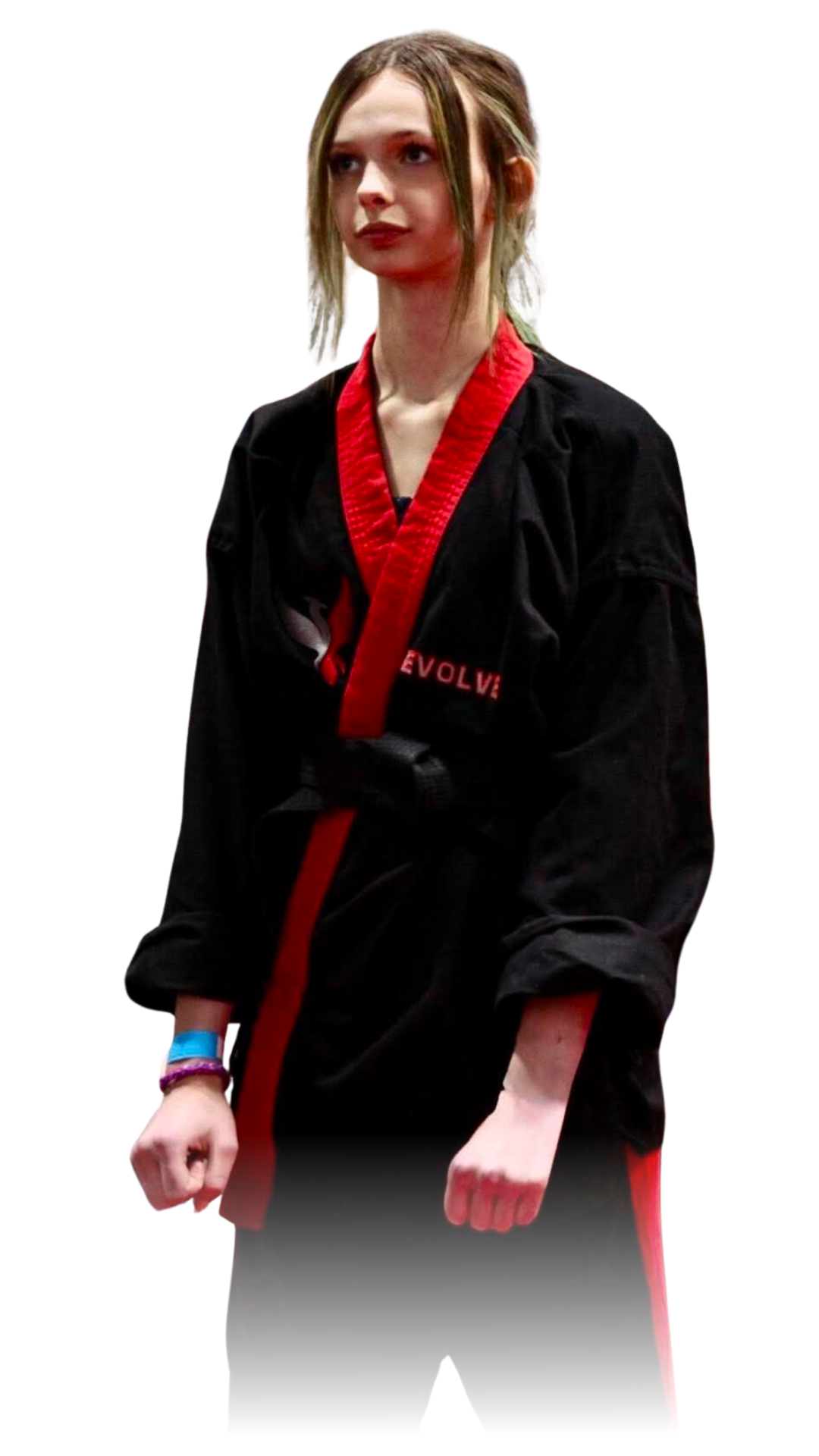 A boy and a girl are practicing karate with black belts