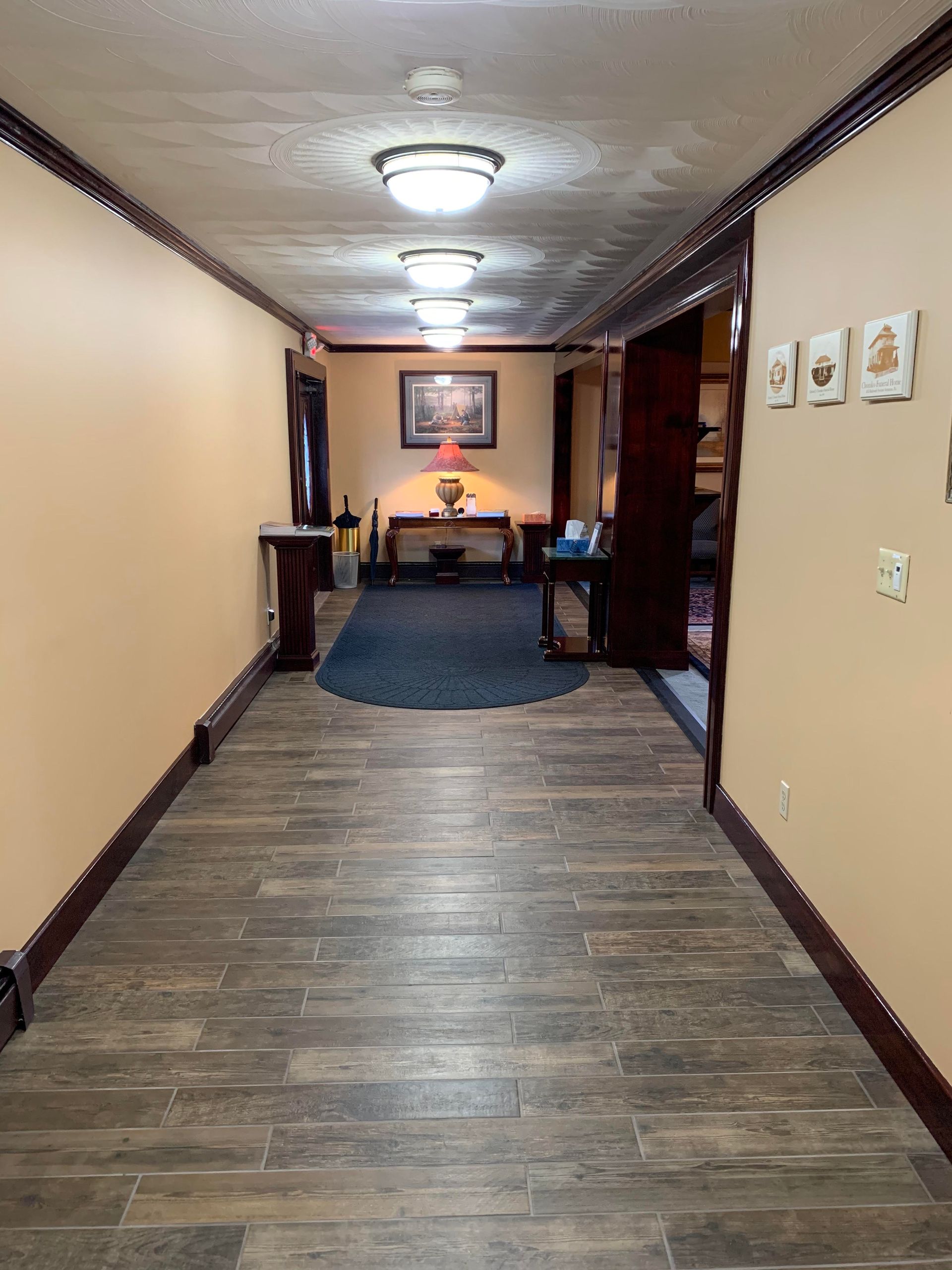 A church with rows of wooden benches and a podium