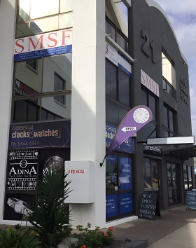 A building with a sign — Coastal Clocks & Watches in Buddina, QLD