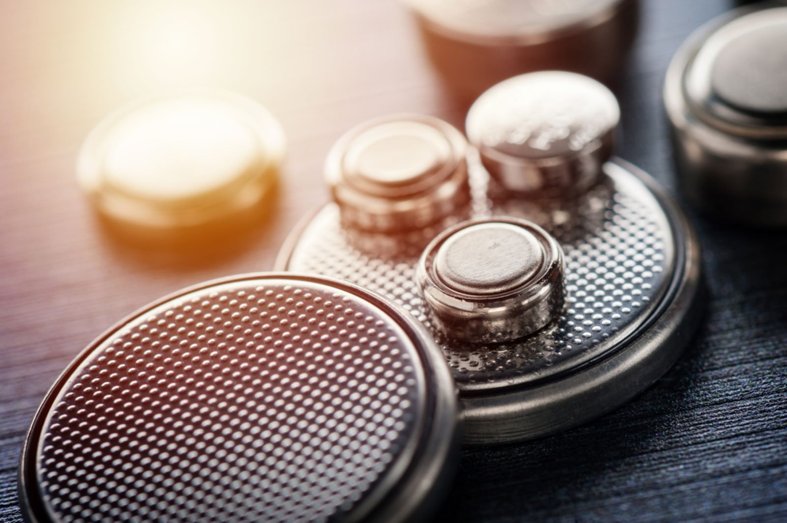 A Group of Batteries Are Sitting on Top of Each Other on a Table — Coastal Clocks & Watches in Buddina, QLD