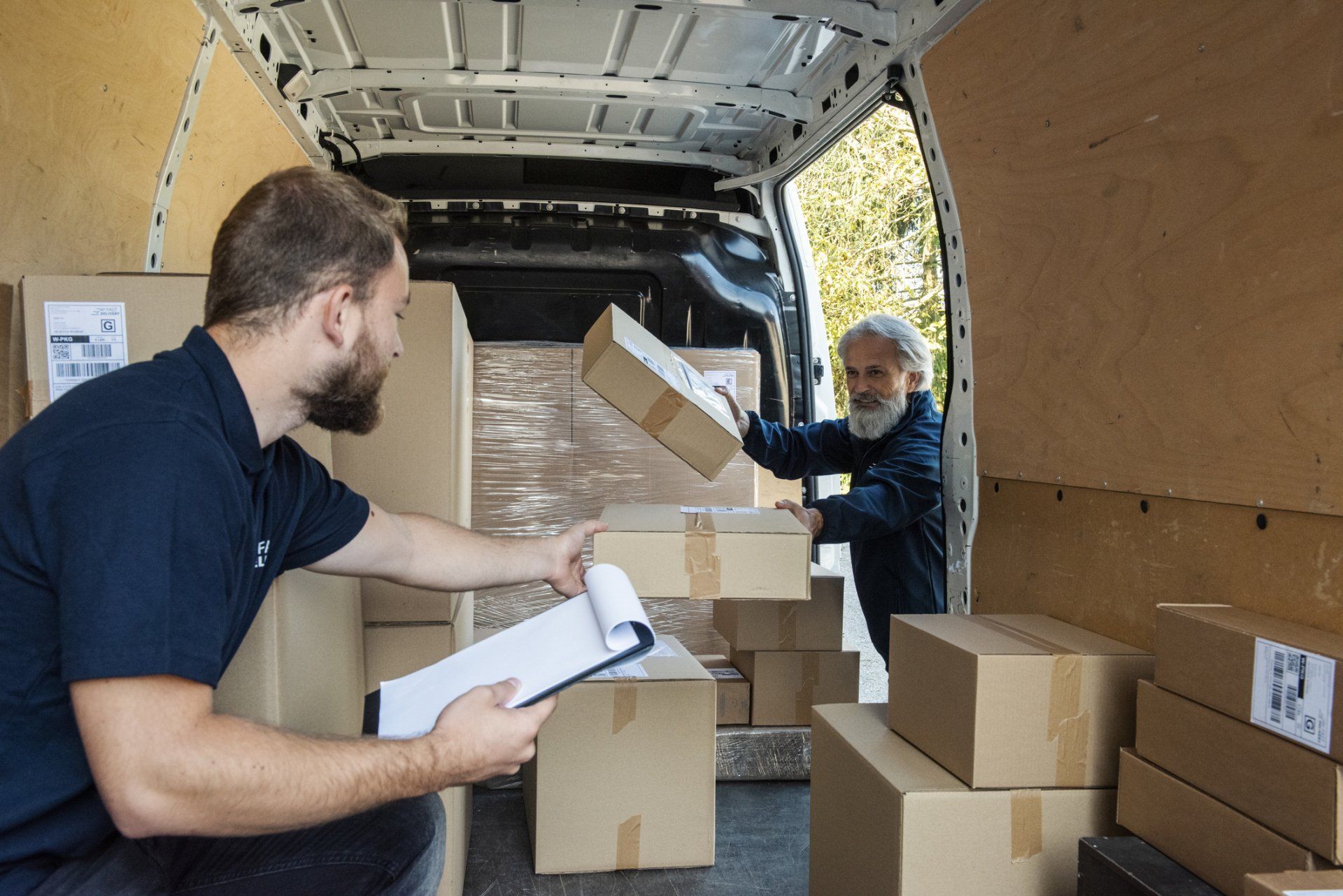 Unloading Cardboard Boxes - Yaphank, NY - Certified Van Service