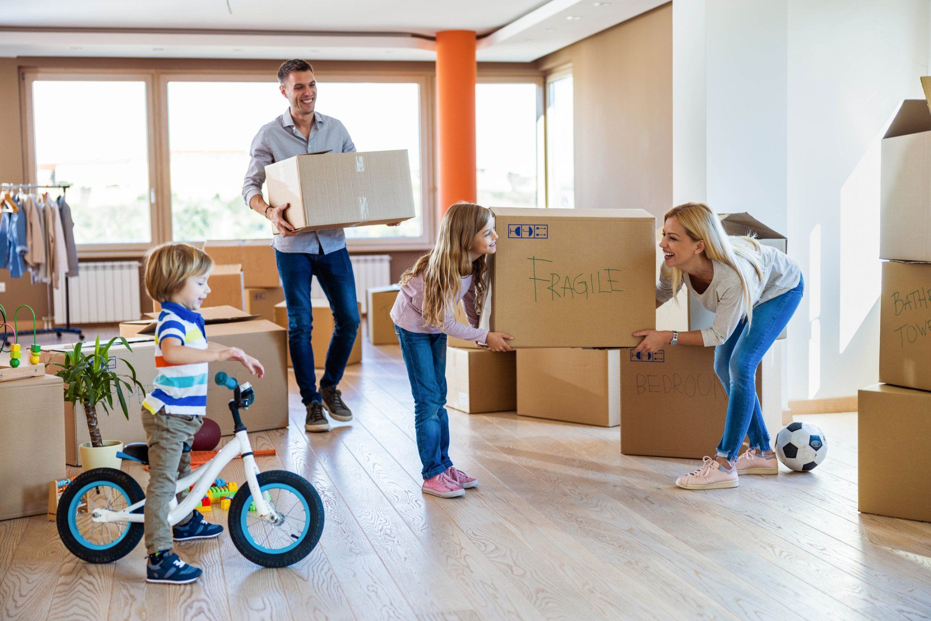 Happy Family Talking While Moving - Yaphank, NY - Certified Van Service