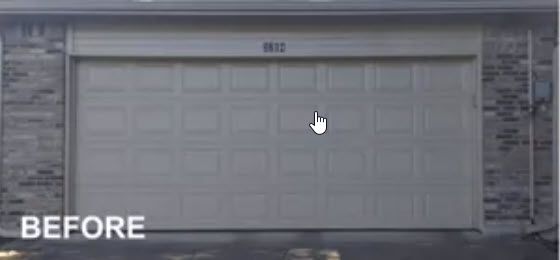 A Picture of A Dirty White Garage Door Before Being Installed.