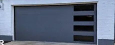 A Picture of A Garage Door Before and After Being Painted Black and Gray