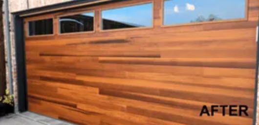 A Close up Of a Wooden Garage Door with Windows.