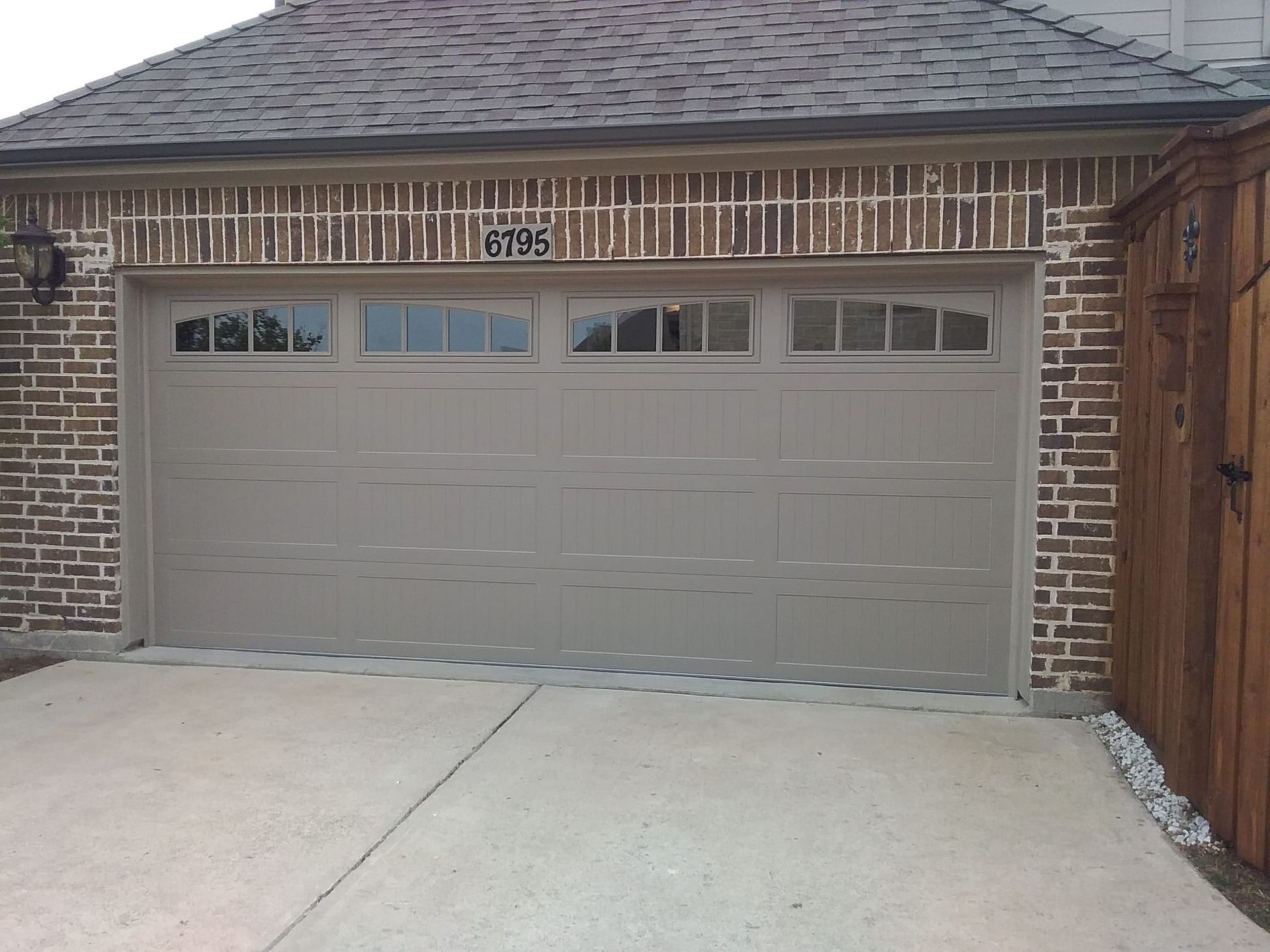 A garage door with the number 0703 on it