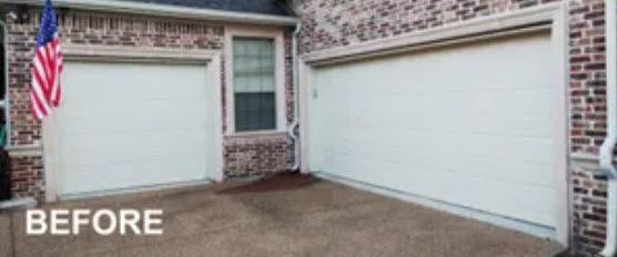 A Before Picture of A House with Two Garage Doors and An American Flag.