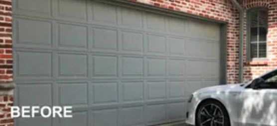 A White Car Is Parked in Front of A Garage Door.