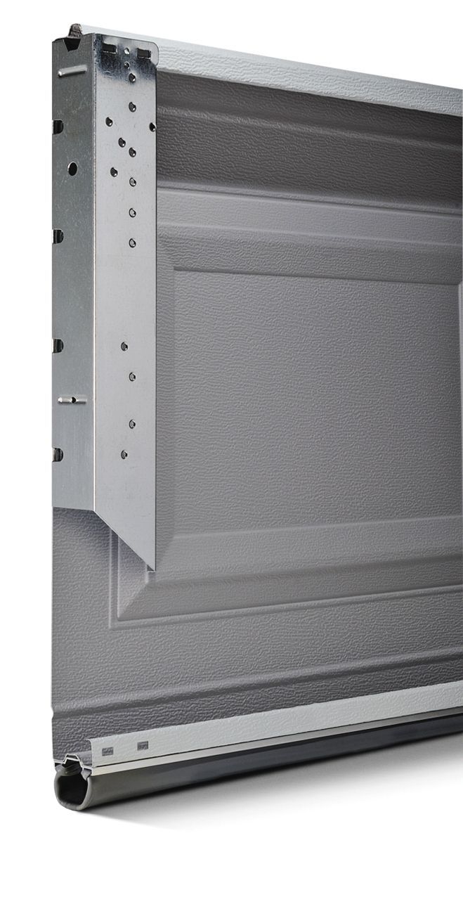 A close up of a garage door on a white background.