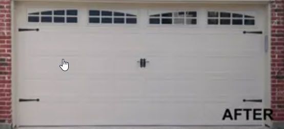 A White Garage Door Is Sitting on Top of A Brick Wall with Black Handle on It