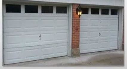 A Picture of A Garage Door Before Being Installed with Light on It