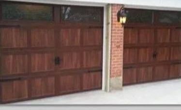 A Picture of A Garage Door Before and After Being Painted with Light on It