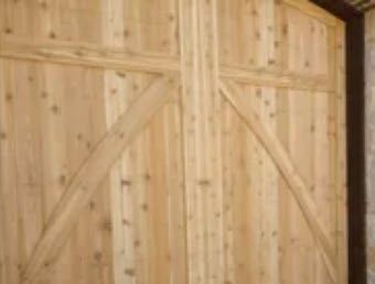 A Picture of A Wooden Garage Door Before and After Being Painted.