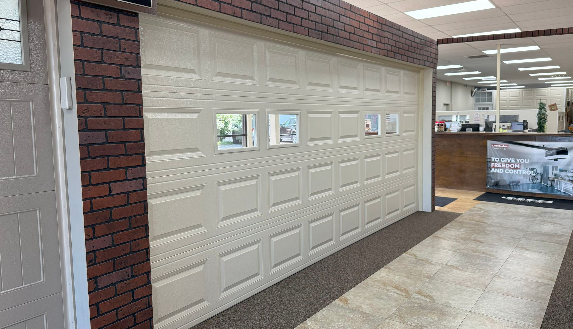 Standard 2 car garage door with 4 plain glass windows.