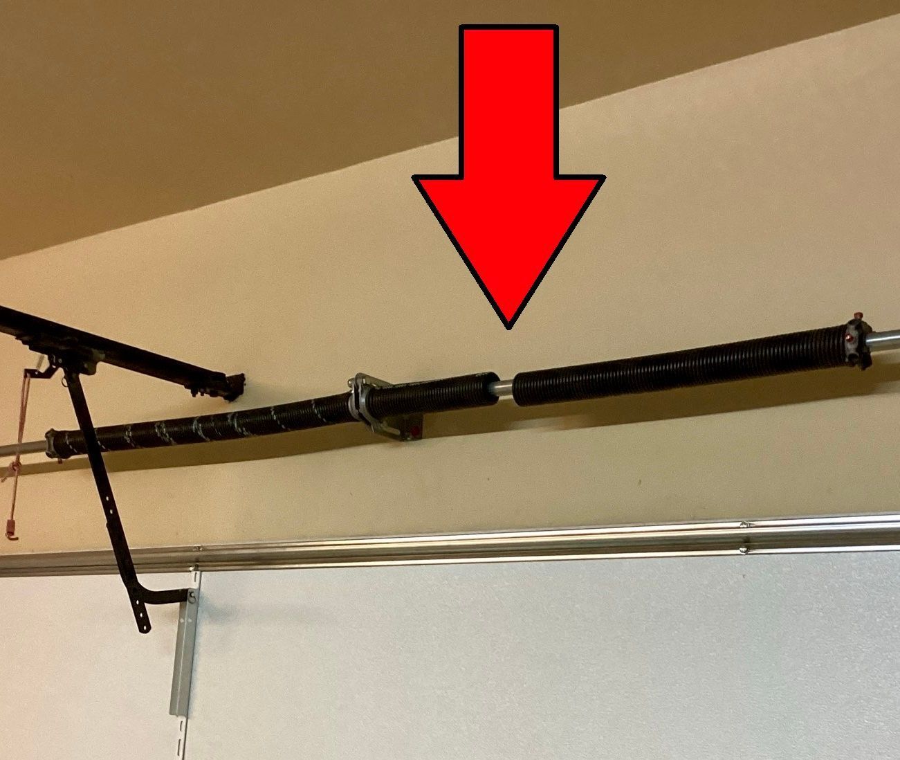 A broken garage door spring -Plano, TX 75074, USA -Plano Overhead Garage Door