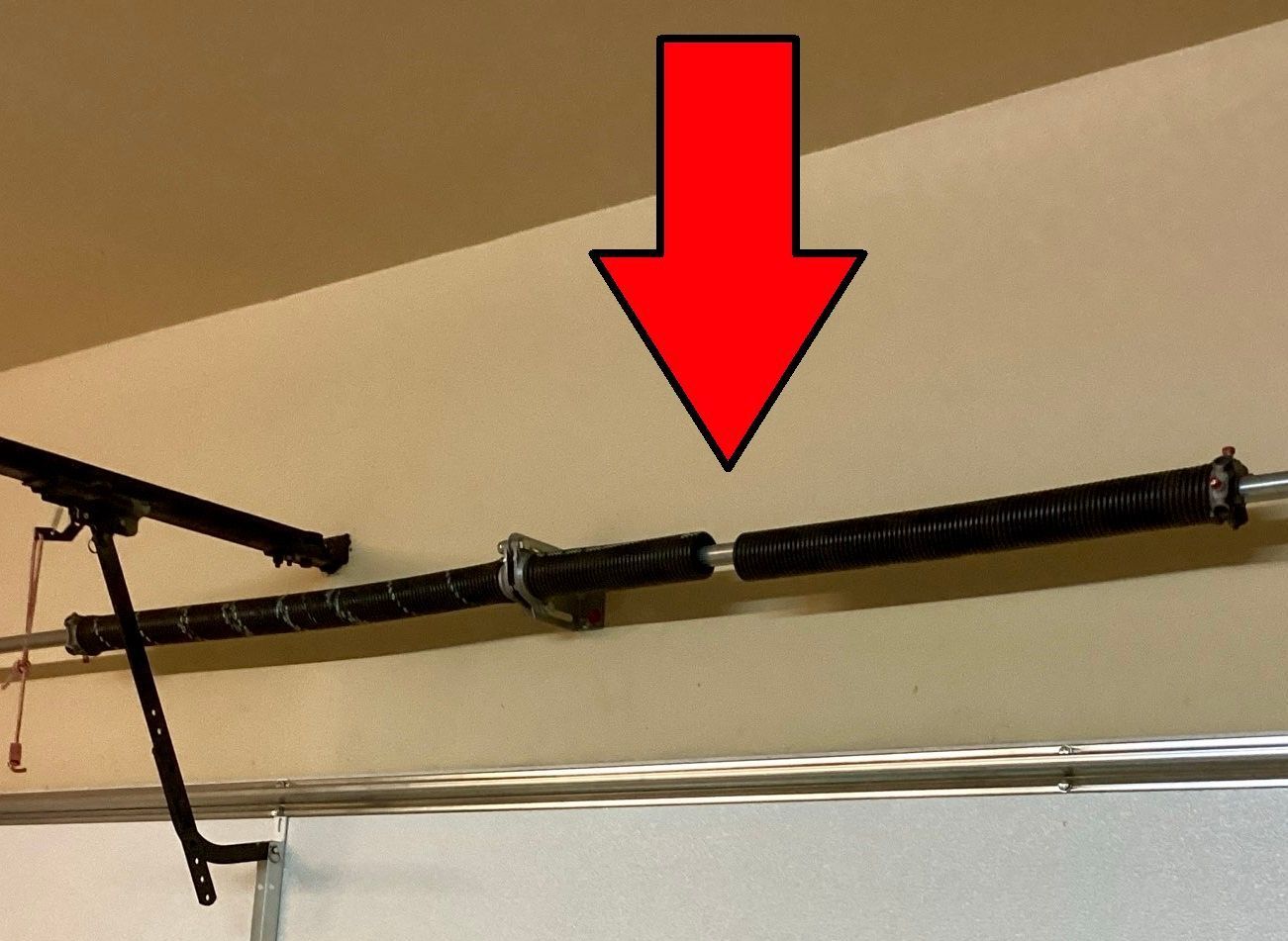 A broken garage door spring -Plano, TX 75074, USA -Plano Overhead Garage Door