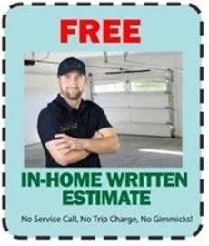 A man is standing in a garage with his arms crossed.