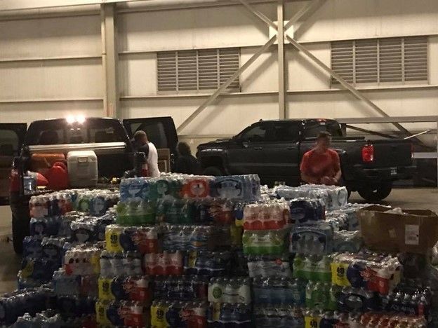 A warehouse filled with lots of bottles of soda