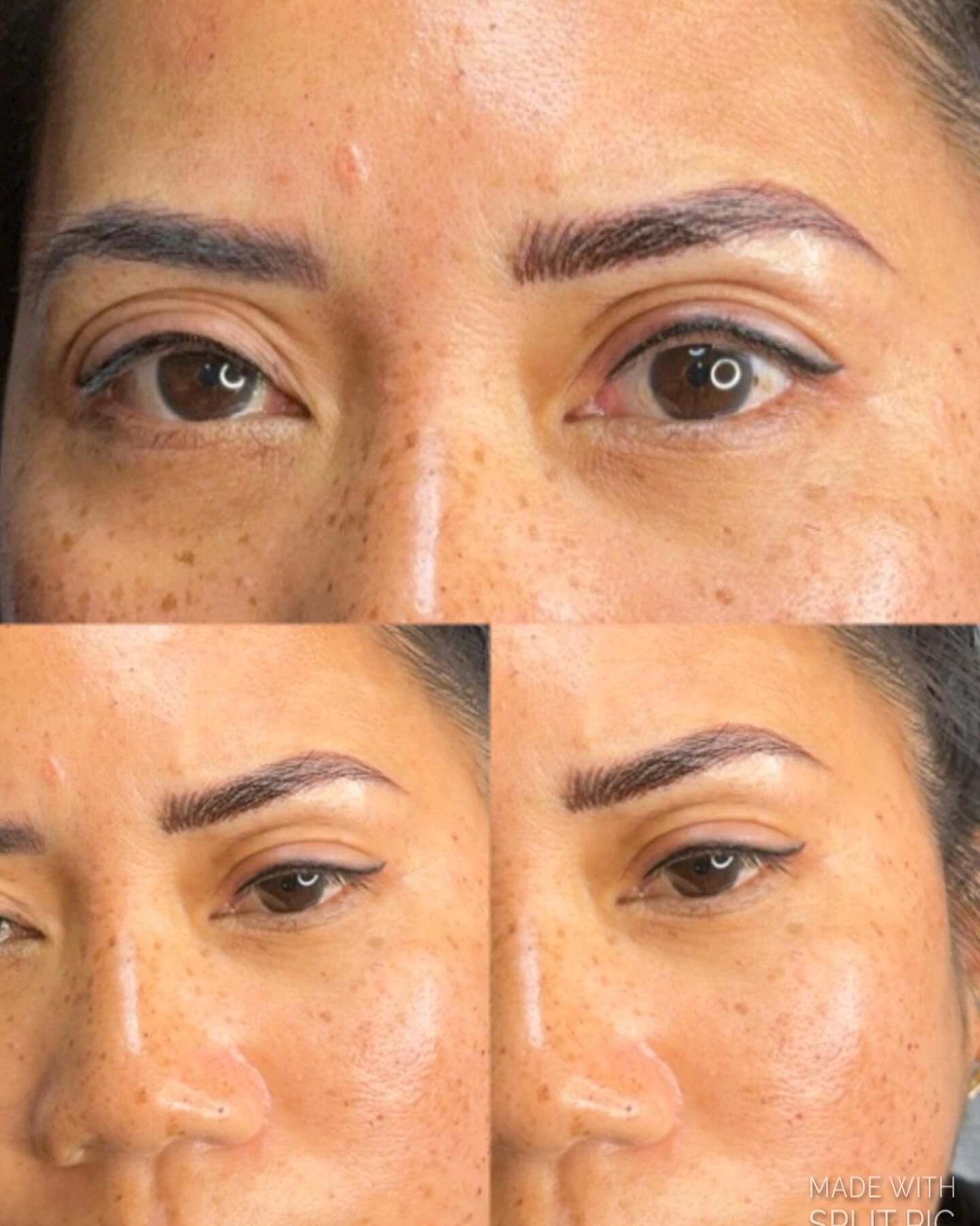 A close up of a woman 's face with eyebrows and freckles.