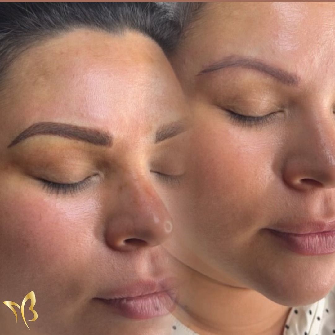 A close up of a woman 's face with her eyes closed