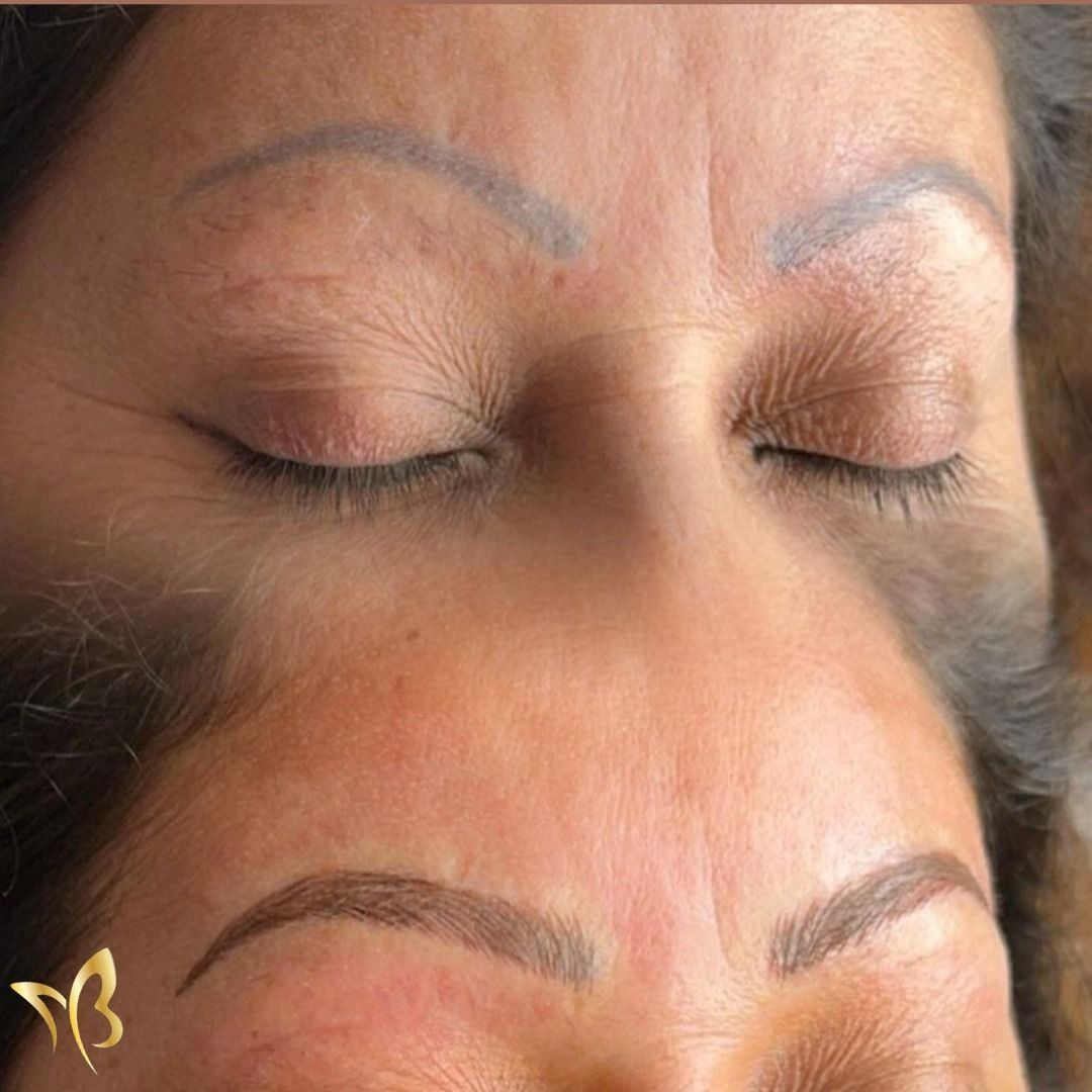 A close up of a woman 's face with her eyes closed.