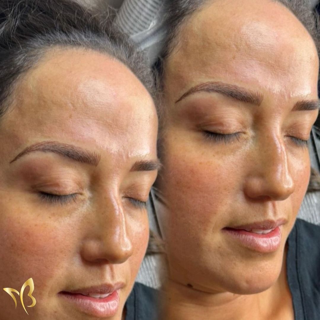 A close up of a woman 's face with her eyes closed.