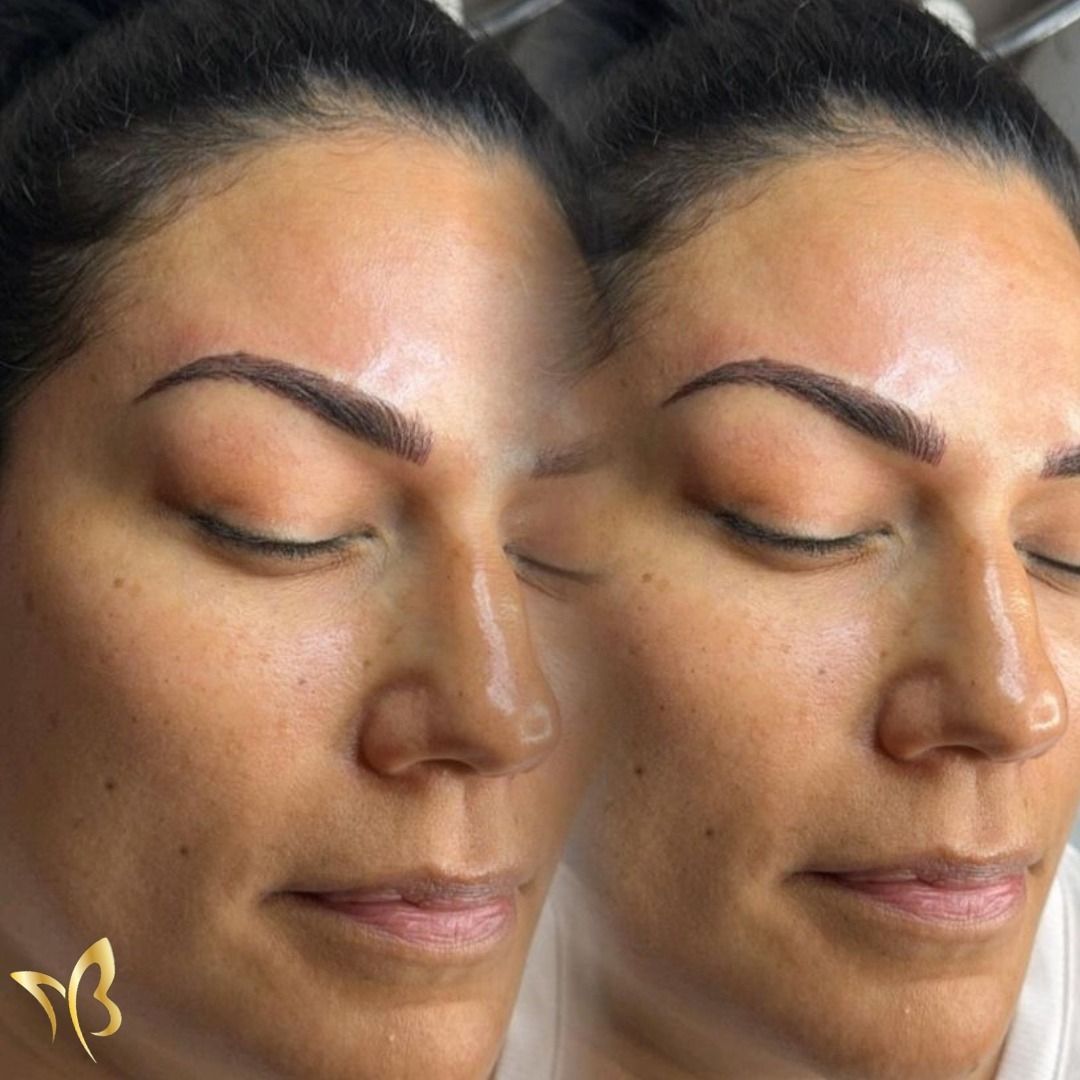 A close up of a woman 's face with her eyes closed