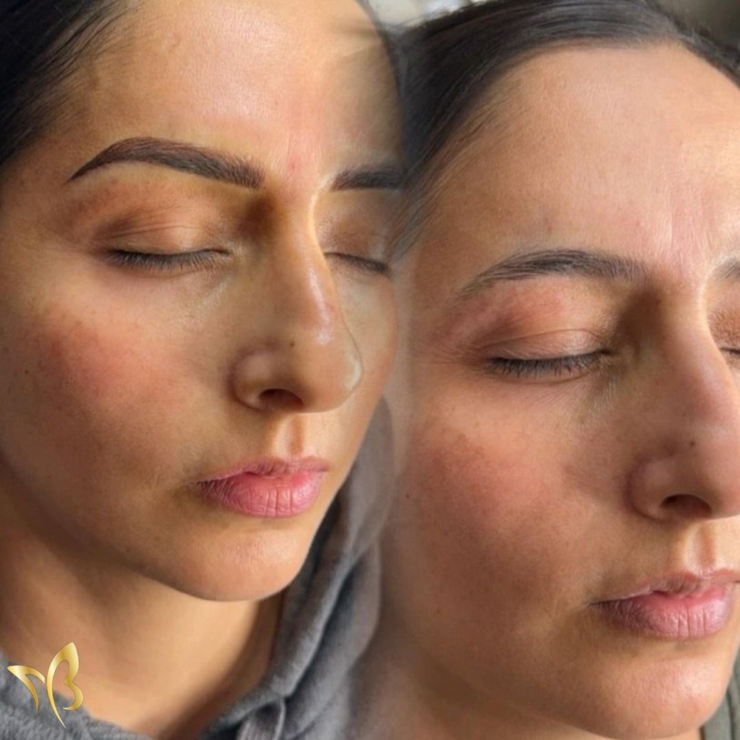 A close up of a woman 's face with her eyes closed.