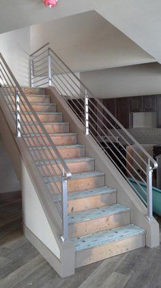 Indoor staircase with iron rails — Experienced Welders in Billings, MT
