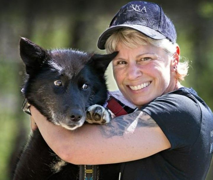 Woman Holding  Dog — Stephens City, VA — Professional Pet Trackers