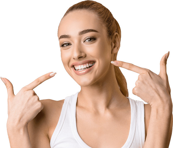 Woman Pointing At Her Beautiful Smile — Floyds Knobs, IN — Knobs Family Dental
