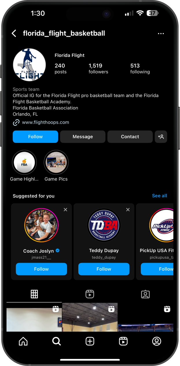 A cell phone with a basketball app open on it.
