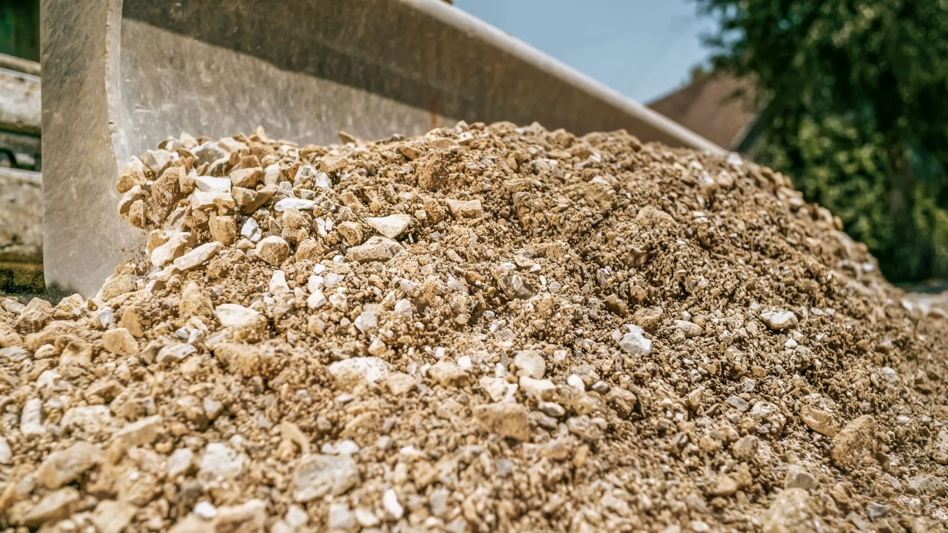 A pile of cream-colored rocks, under the sun.